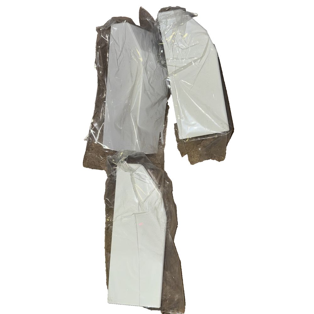 Argo Baseboard 55PT2-3LEC 3 Pack – a white plastic bag with a brown plastic bag