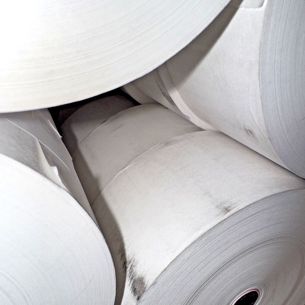 2.37"x800' Phenol Free 12 Rolls, DaveyDooDeals – a pile of rolls of white paper