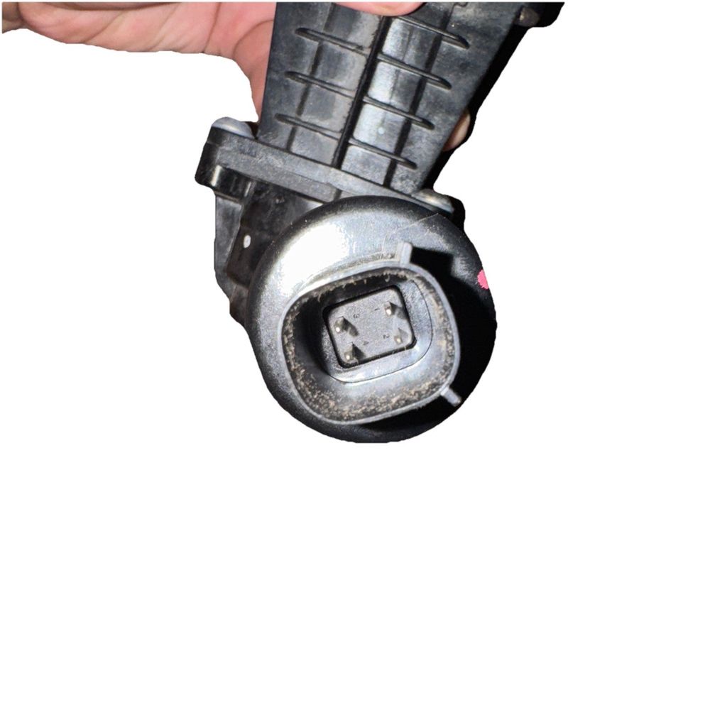 FORD Mustang Mach-E Rear Right Door Soft Close Unit LJ8B-14B287-AE – a hand holding a metal ball valve