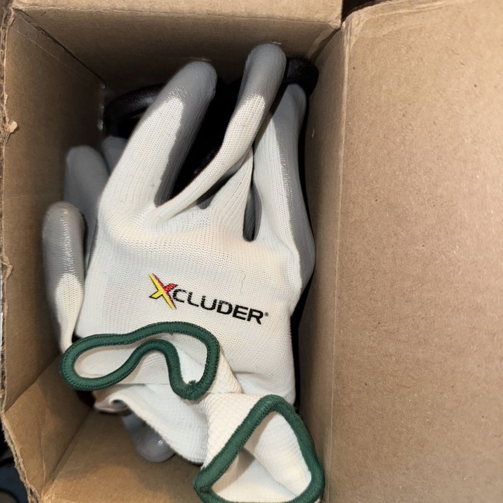 Xcluder Rodent Control Fill Fabric - Steel Wool Blend, Xcluder' – a box with a pair of gloves inside of it