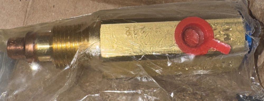Sentinel Diesel Engine Protection Part #: H-212, DaveyDooDeals – a brass fitting on a piece of plastic