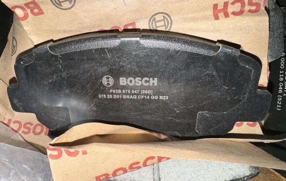 Bosch BC1623 QuietCast Premium Ceramic Disc Brake Pad Set Missing Hardware – a close up of a brake pad