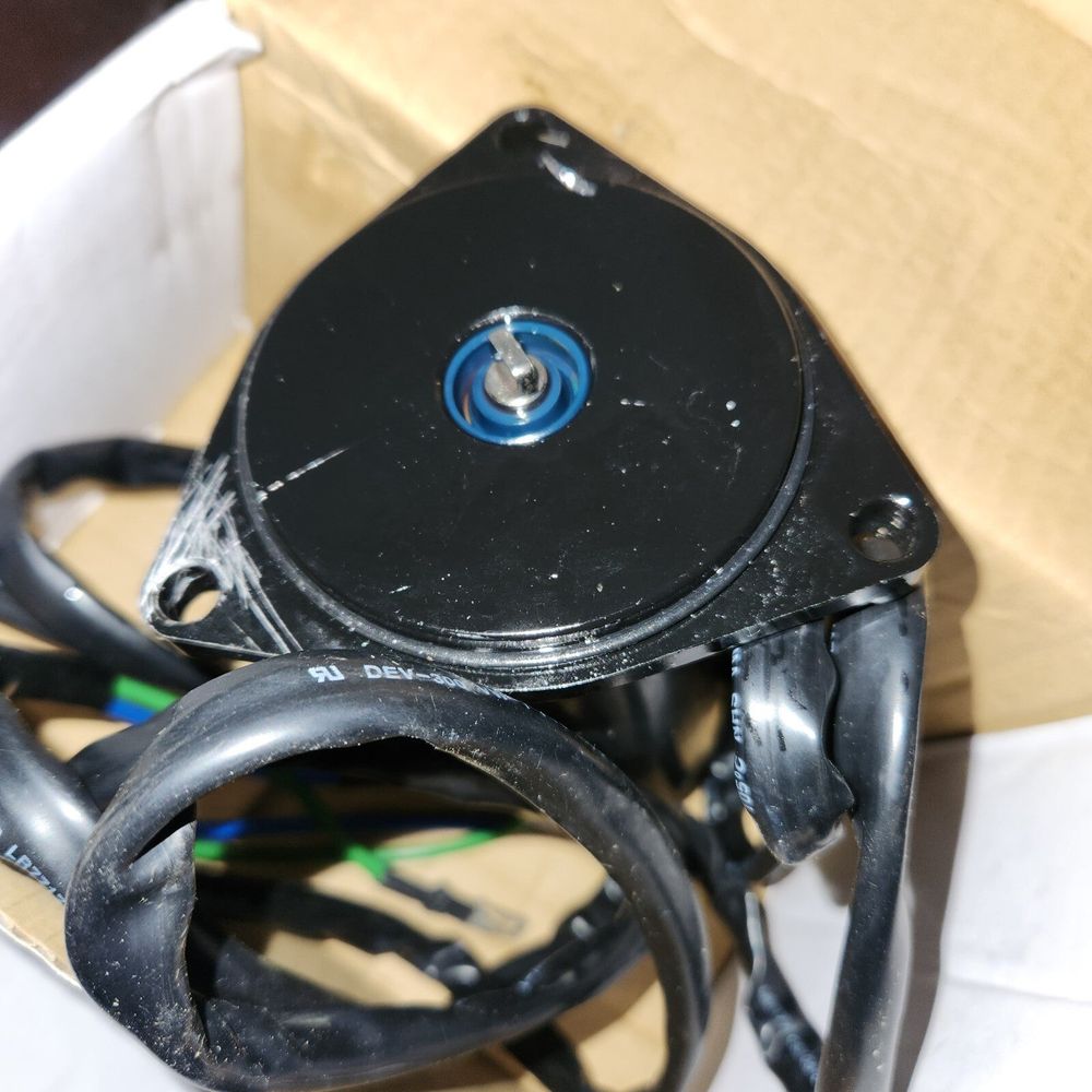 DB Electrical 430-20007 Power Tilt Trim Motor Compatible with-Replacement for Ev – a box with a black handle