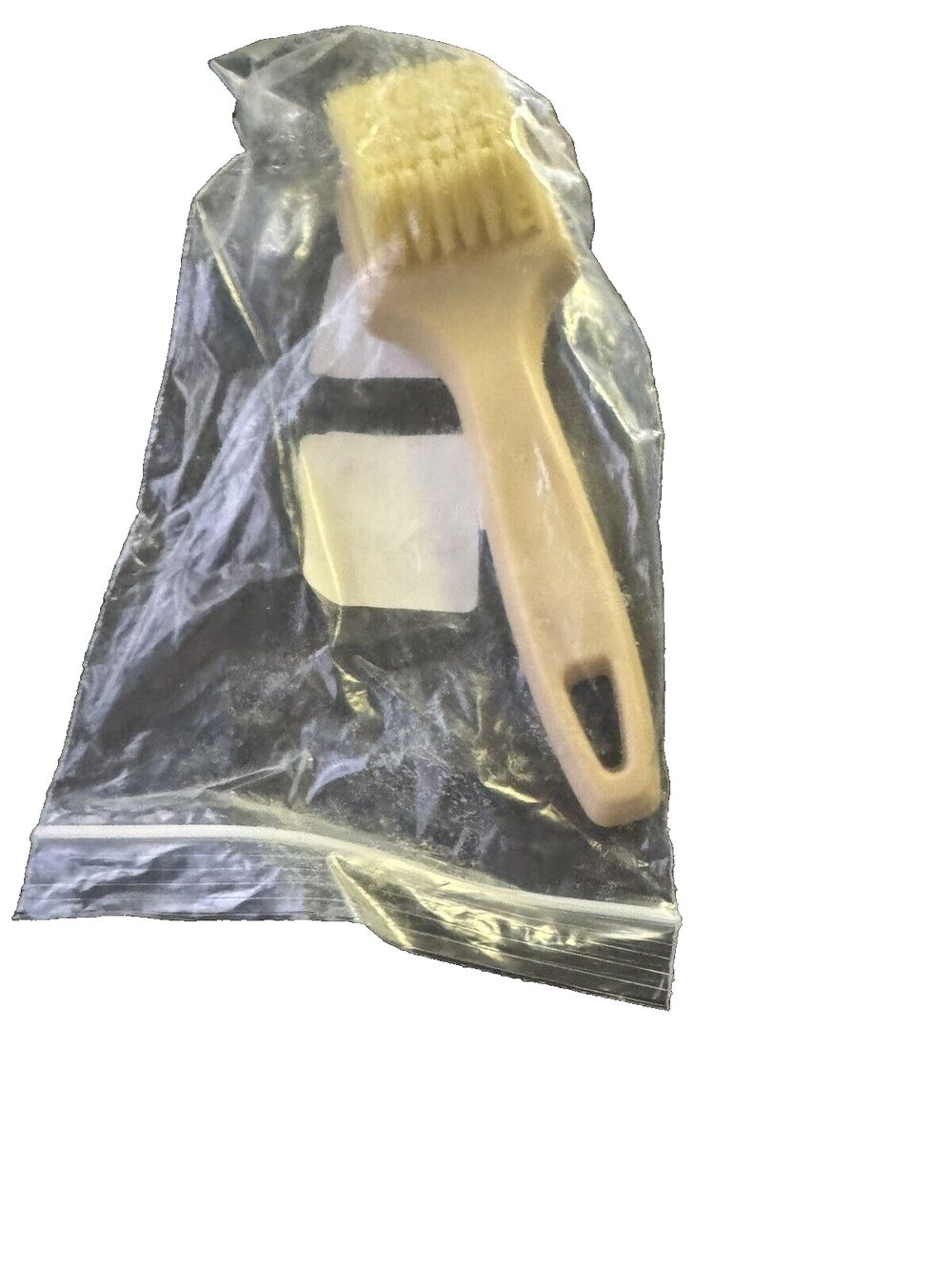 Chemical Guys ACCG25 Induro 7 Heavy Duty Nifty Interior Carpet-Upholstery Detail – a toothbrush in a plastic bag