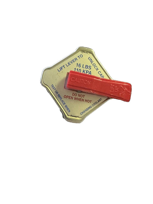 Stant Radiator Cap Silver – a red rubber pad with a white background
