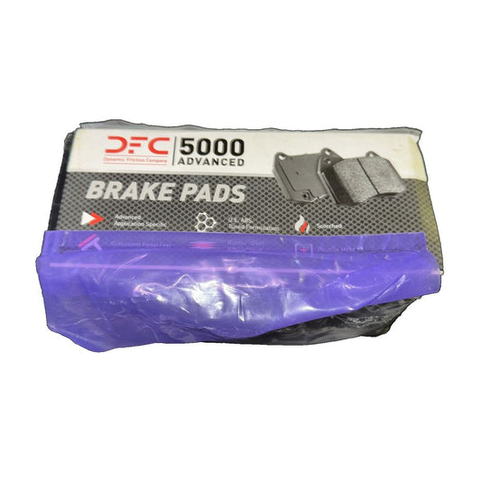 Dynamic Friction 1551-0905-00 - 5000 Advanced Ceramic Brake Pads - Ceramic – the back of a purple plastic bag with a black handle