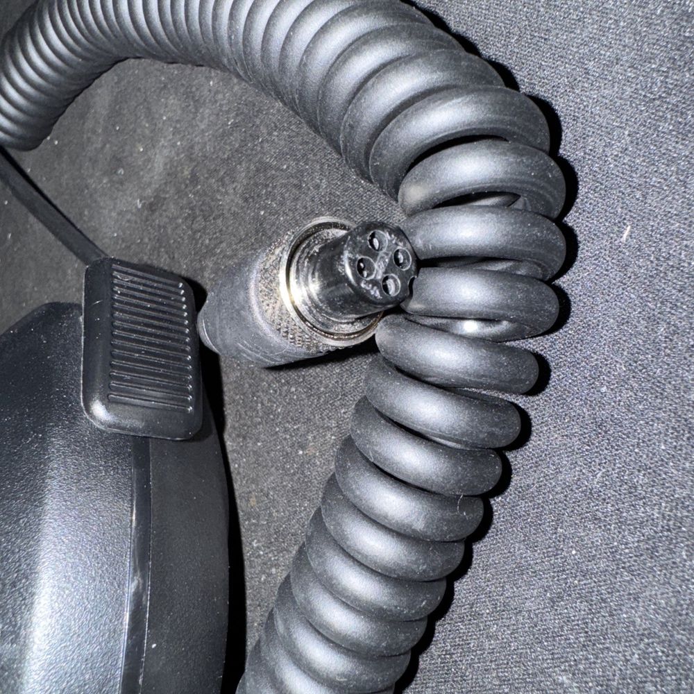 Speaker Microphone With Mount Clip, Unbranded – a close up of a telephone with a cord