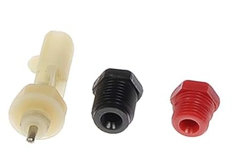 Dorman M630276 Brake Master Cylinder Compatible with Select Models – a set of two plastic pushers with a red and black one