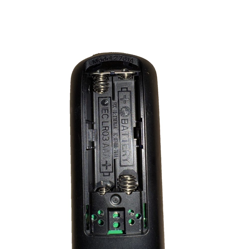 Bell Fibe Slim Remote Model 2761A – a black and green light switch on a white background
