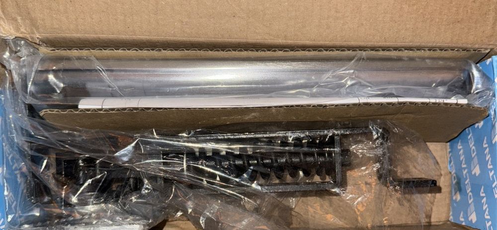 Deltana DASH95U26D Solid Brass Double Action Spring Hinge with Solid Brass Cover – a box with a bunch of screws and a box with a bunch of s…