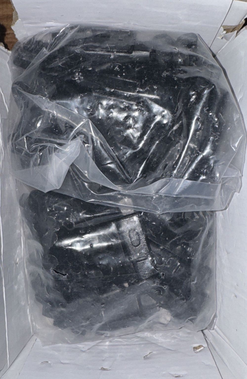 100 PCS 1.00z Steel Wheel balancing Mount Black, DaveyDooDeals – a box with some black plastic material inside