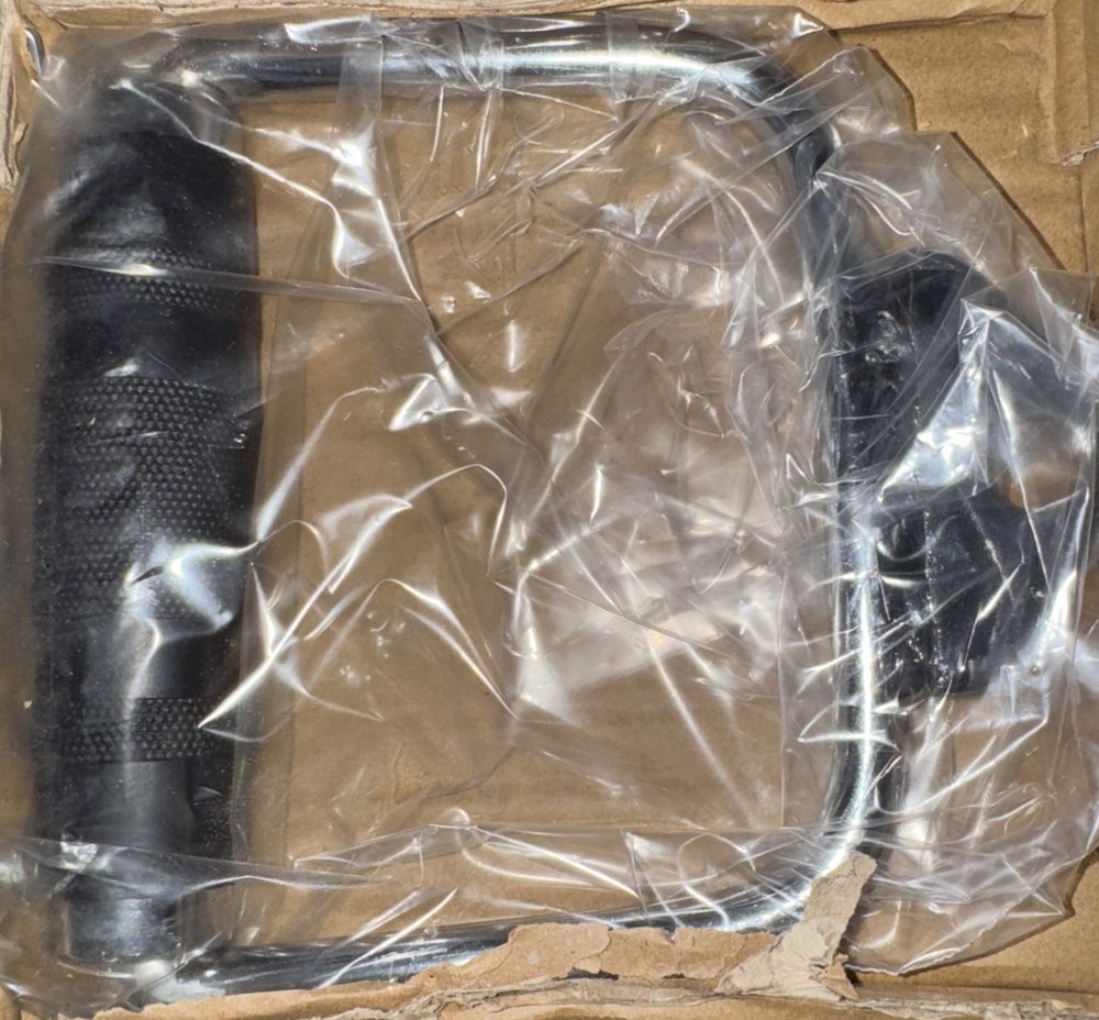 Single D Rubber Handle Home Gym Handle, Unbranded – a black knife in a plastic bag