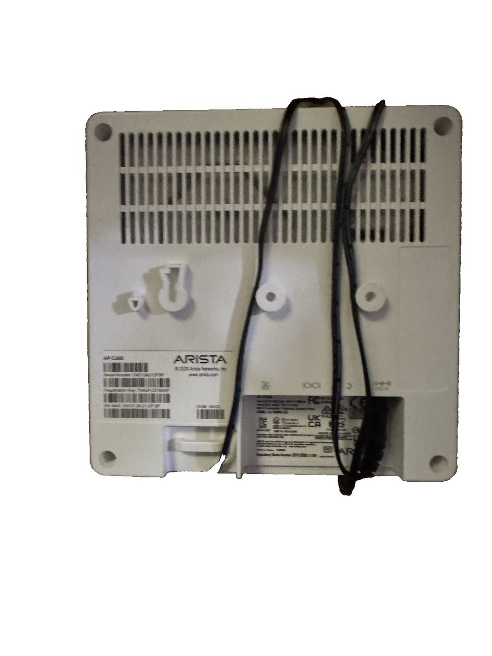 ARISTA AP-C200 DUAL AUDIO ACCESS POINT – a white plastic enclosure with a black cord