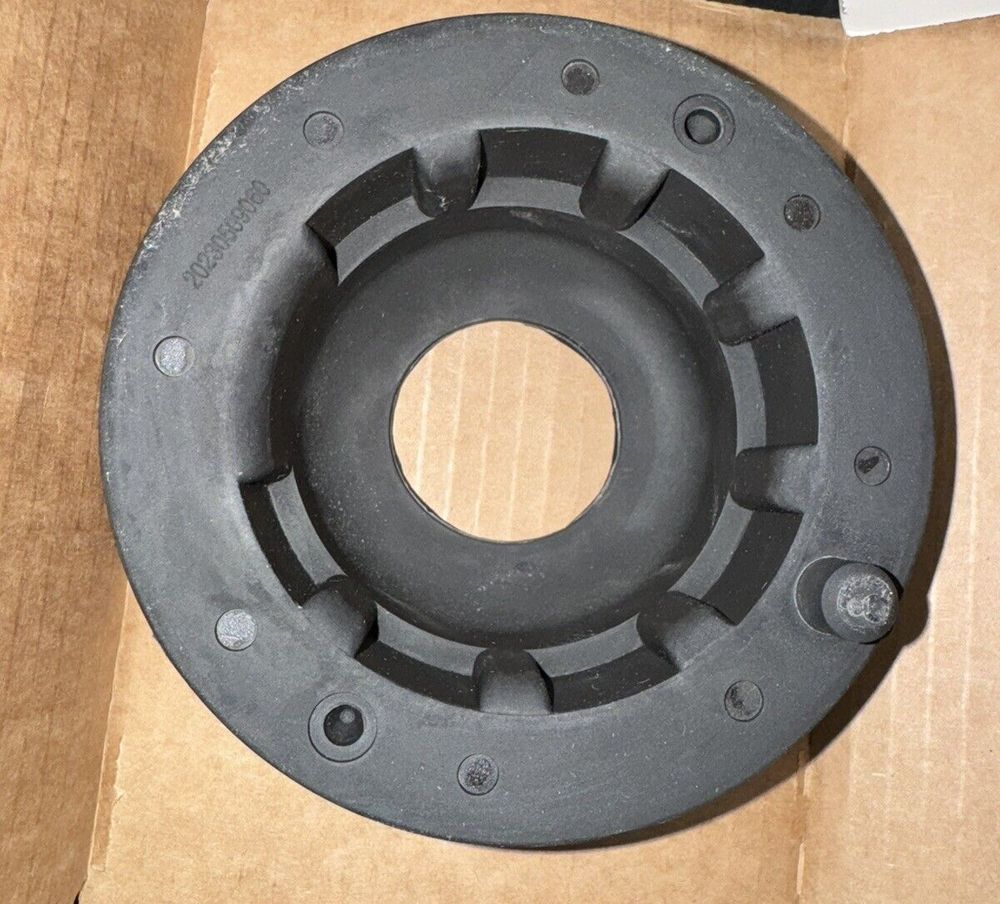 MOOG K160041 Coil Spring Insulator for Jeep Grand Cherokee – a black plastic ring on a cardboard box