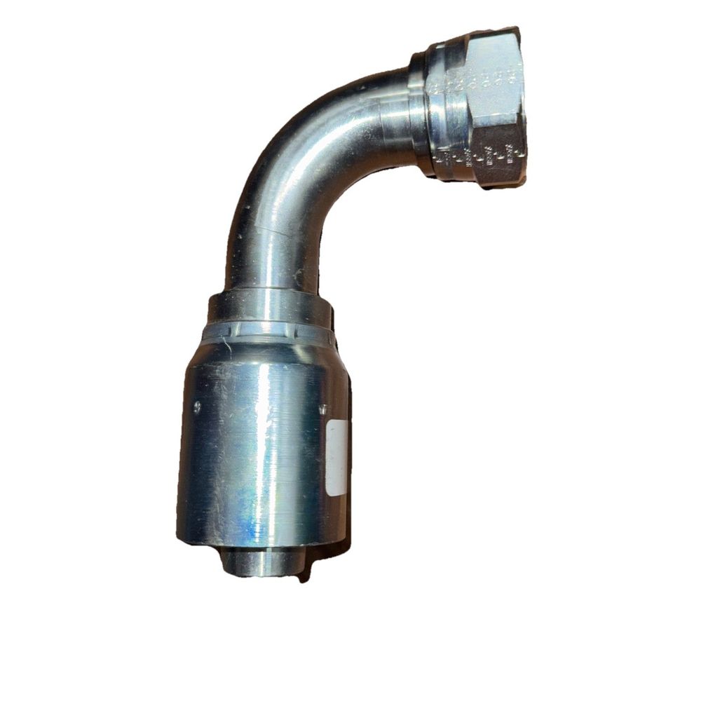 Crimp Style Hydraulic Hose Fitting – 77 Series Fittings Part #: 13977-20-20, Parker – a stainless pipe with a white background