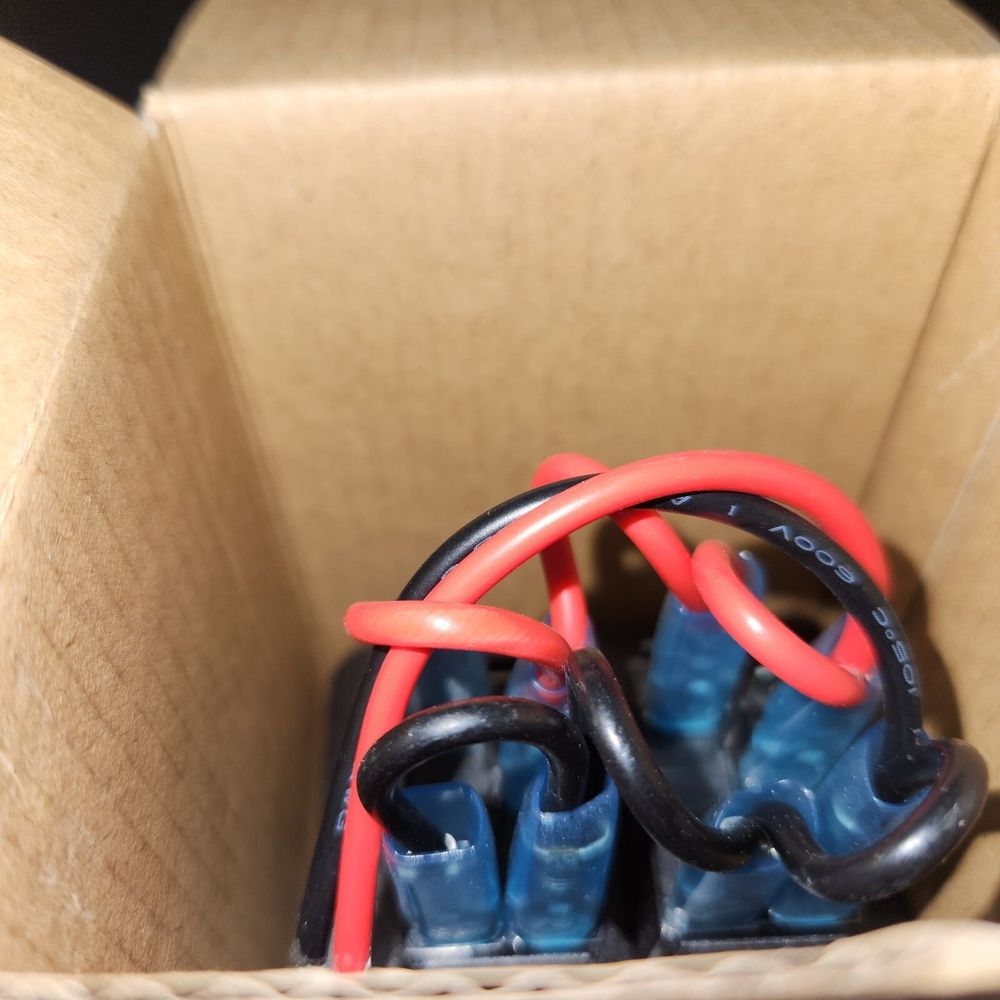 Nilight 90106B 2 Gang Rocker Switch Panel 5 Pin On Off Pre-Wired Rocker Switch A – a pair of blue and red shoes in a cardboard box