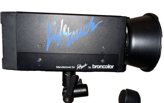 Broncolor EL-9472-CSA 450WS Monolight - Premium Studio Lighting for Professional – a microphone with a blue logo on it