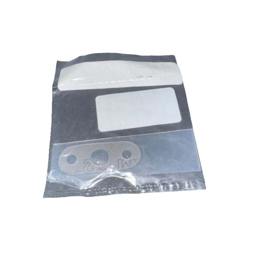 Turbocharger Oil Return Line Gasket MTC 171406 – a piece of plastic with a white label on it