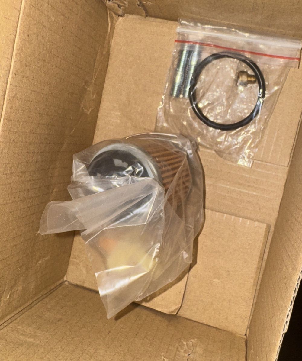 Carburetor For yamaha Breeze 125, Unbranded – a box with a small object inside of it