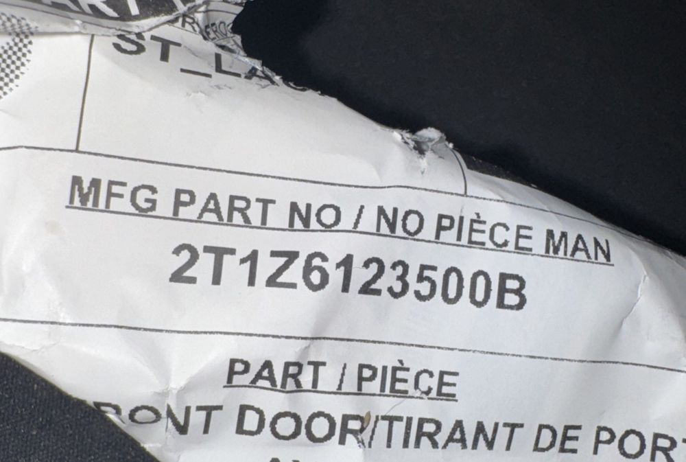 2010-2013 Ford Transit Connect - Door Check - Ford (2T1Z-6123500-B) – a piece of paper with a piece of paper on it