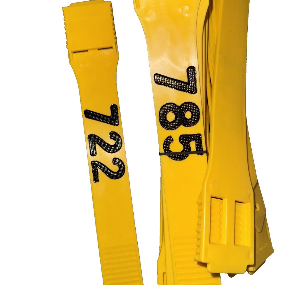 Multi-Lock Animal Leg Band Assorted Numbers 19 Pack, Unbranded – a pair of yellow rubber boots with black numbers