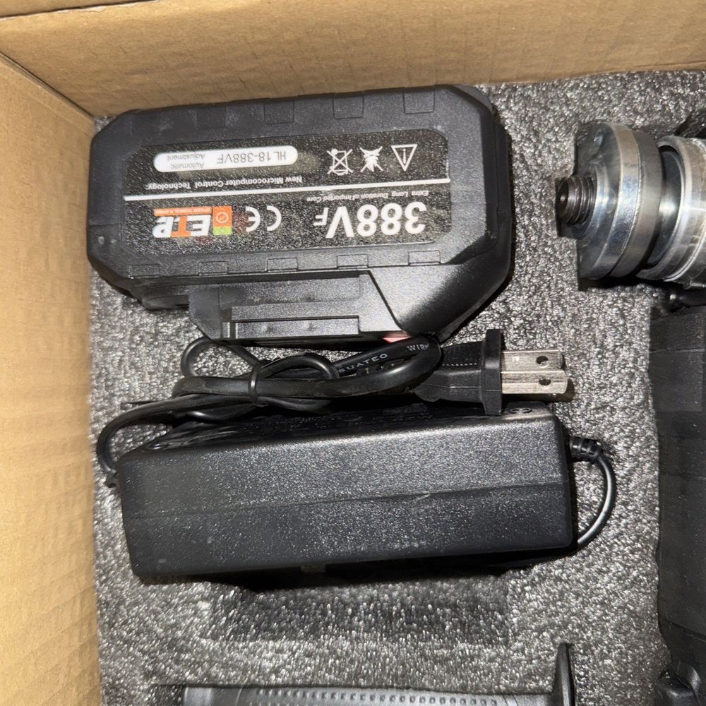 YoFidra Angle Grinder With 1 battery/Charger – a camera and a battery in a box
