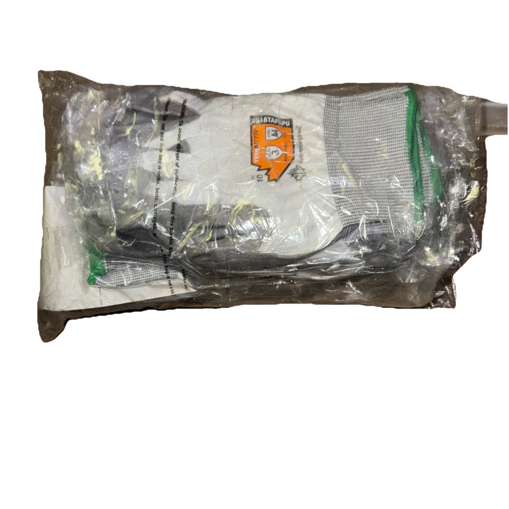 SUPERIOR GLOVE S18TAFGPU10 Cut-Resistant Gloves,Glove Size 10,PR 11 Pack – a bag of white gloves with a green and orange logo