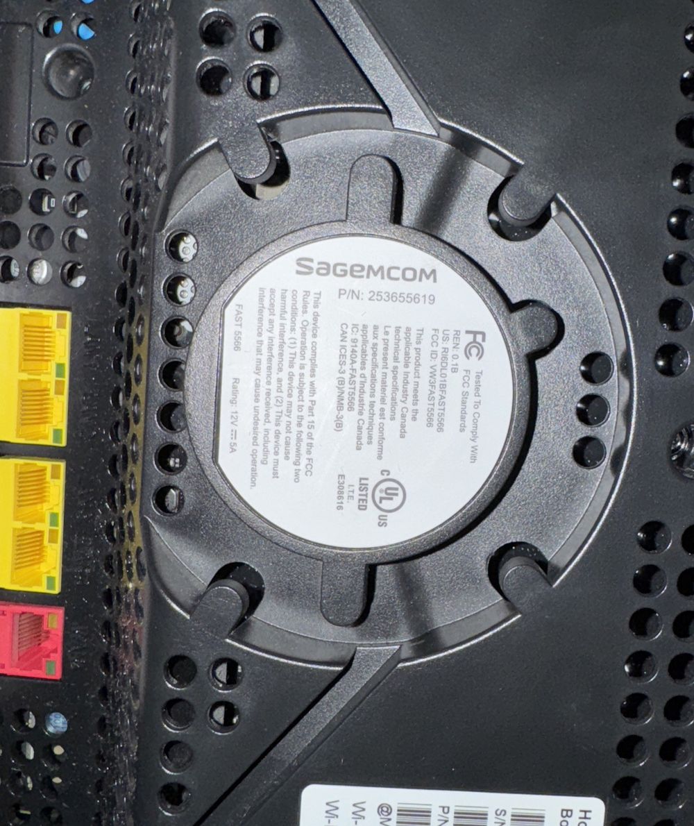 Bell SageMCom Home Hub 3000 Fast 5566 No Cords #253655619 Matte Finish – a close up of a hard disk on a laptop