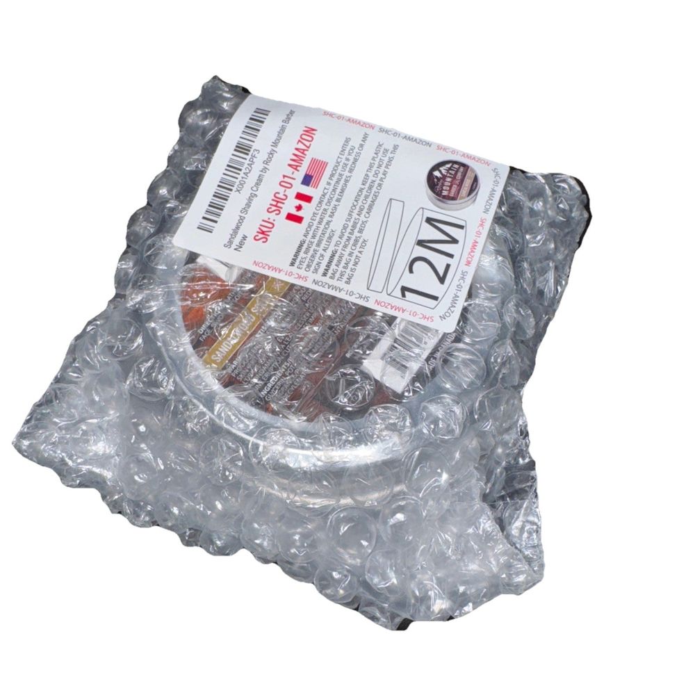 Sandal Wood Shaving Cream By Rocky Mountain Barber, Mountain barber Company – a package of condoms in plastic wraps