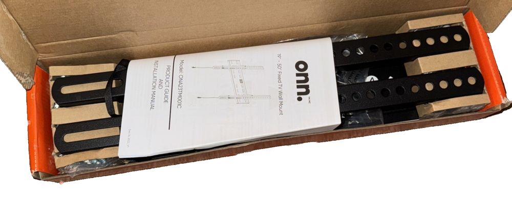 onn. 19 in.–50 in./48.26 cm–127 cm Fixed TV Wall Mount, Holds 50 lbs/22.7 – a box with a box of parts inside