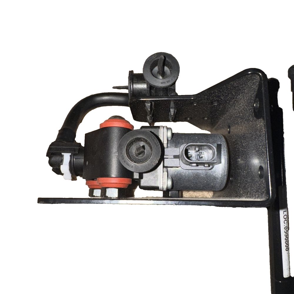 Climate Control - Water Control Valve, WABCO – a black and red tool is on a white surface