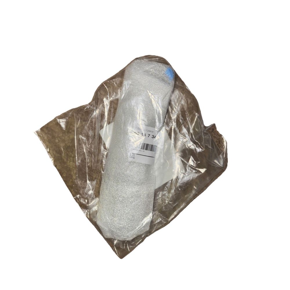 Reflector - BMW (63-14-7-349-128), DaveyDooDeals – a bottle of water sitting on top of a plastic bag