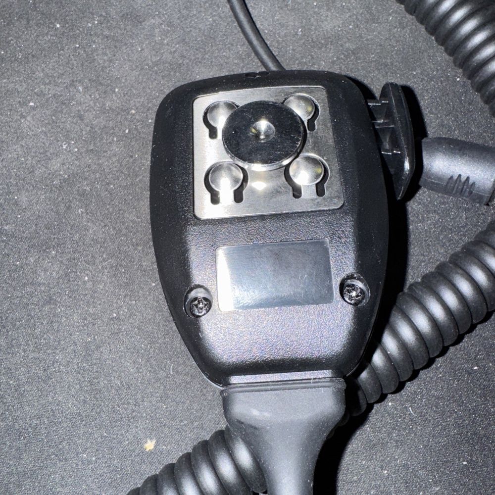 Speaker Microphone With Mount Clip, Unbranded – a close up of a cell phone on a table