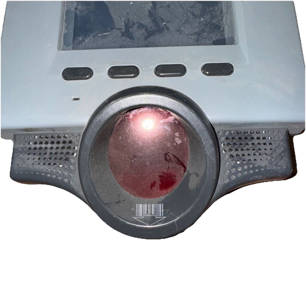 Symbol Technoligies K1150-0N0DAKBWTWW Data Terminal (No cords) – a close up of a computer with a red light