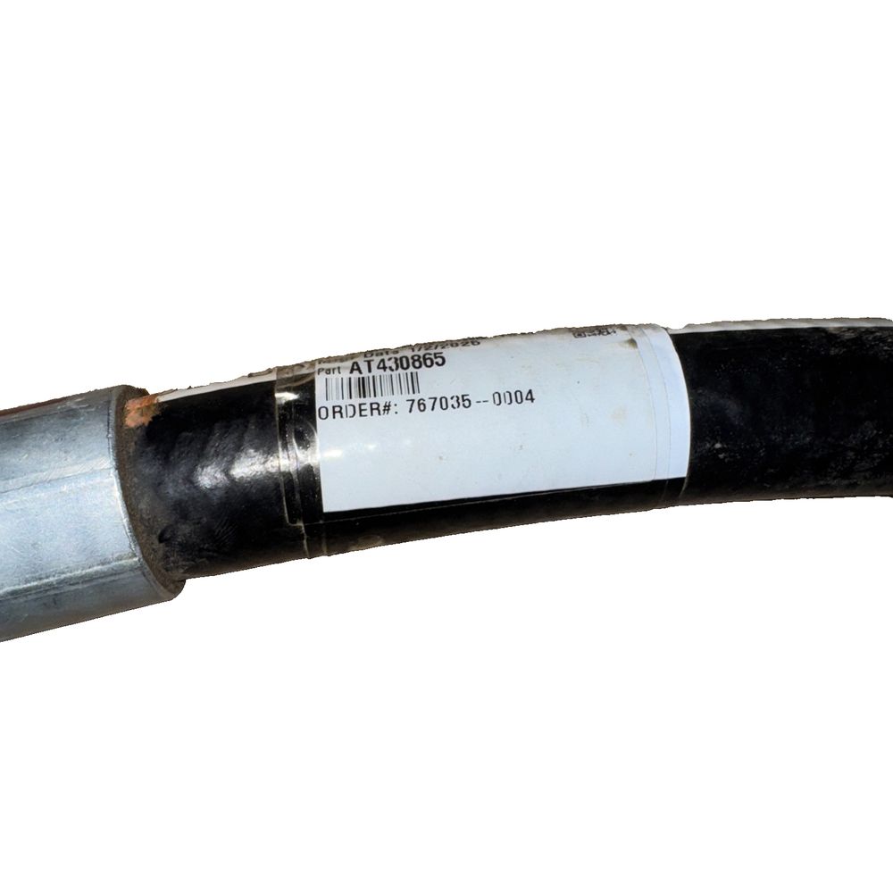 AT430865: Ride Control Valve Hydraulic Hose Parker – a close up of a pipe with a white background