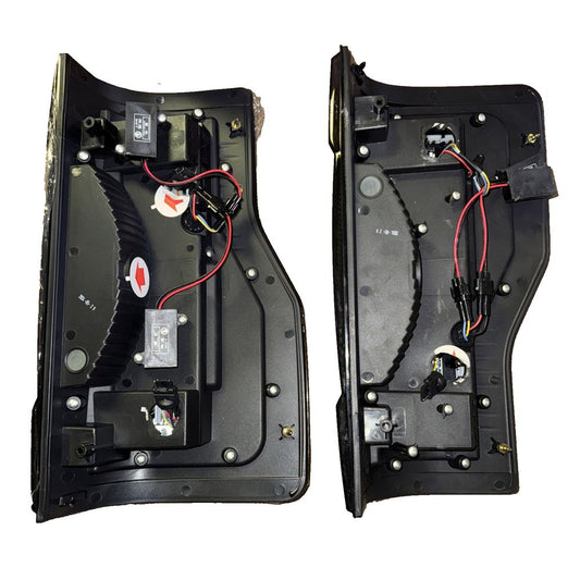 Winjet LED Tail Lights for 2017–18 Ford F250–F450 w/Sequential Signals – two black plastic boxes with wires and wires