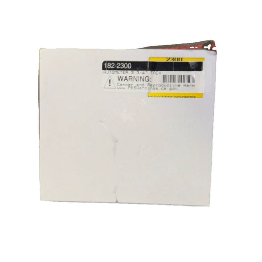 Auto Meter 182-2300 Auto Gage Black 3-3/4" 8000 RPM Tachometer – a white box with a label on it