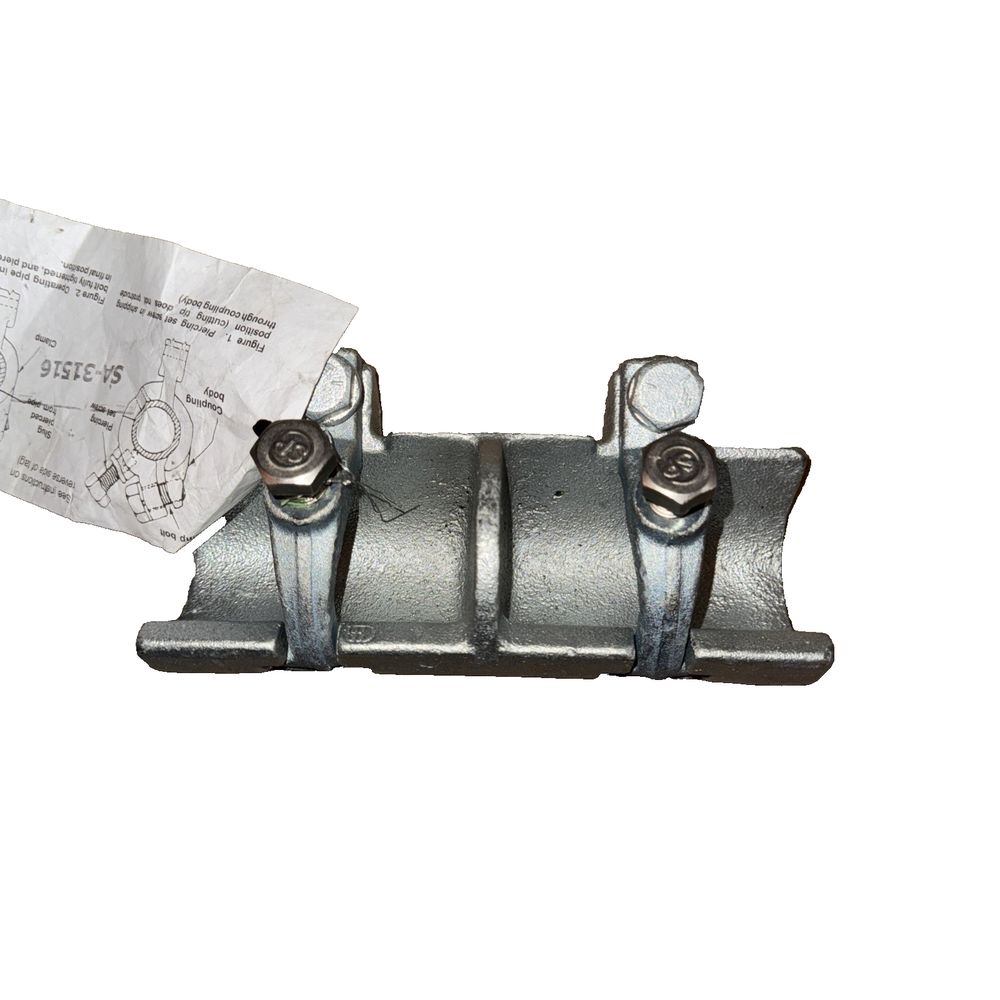 1-1/2-Inch IPS Electrical Straight Coupling SA-31516 – a pair of metal latchs with a paper