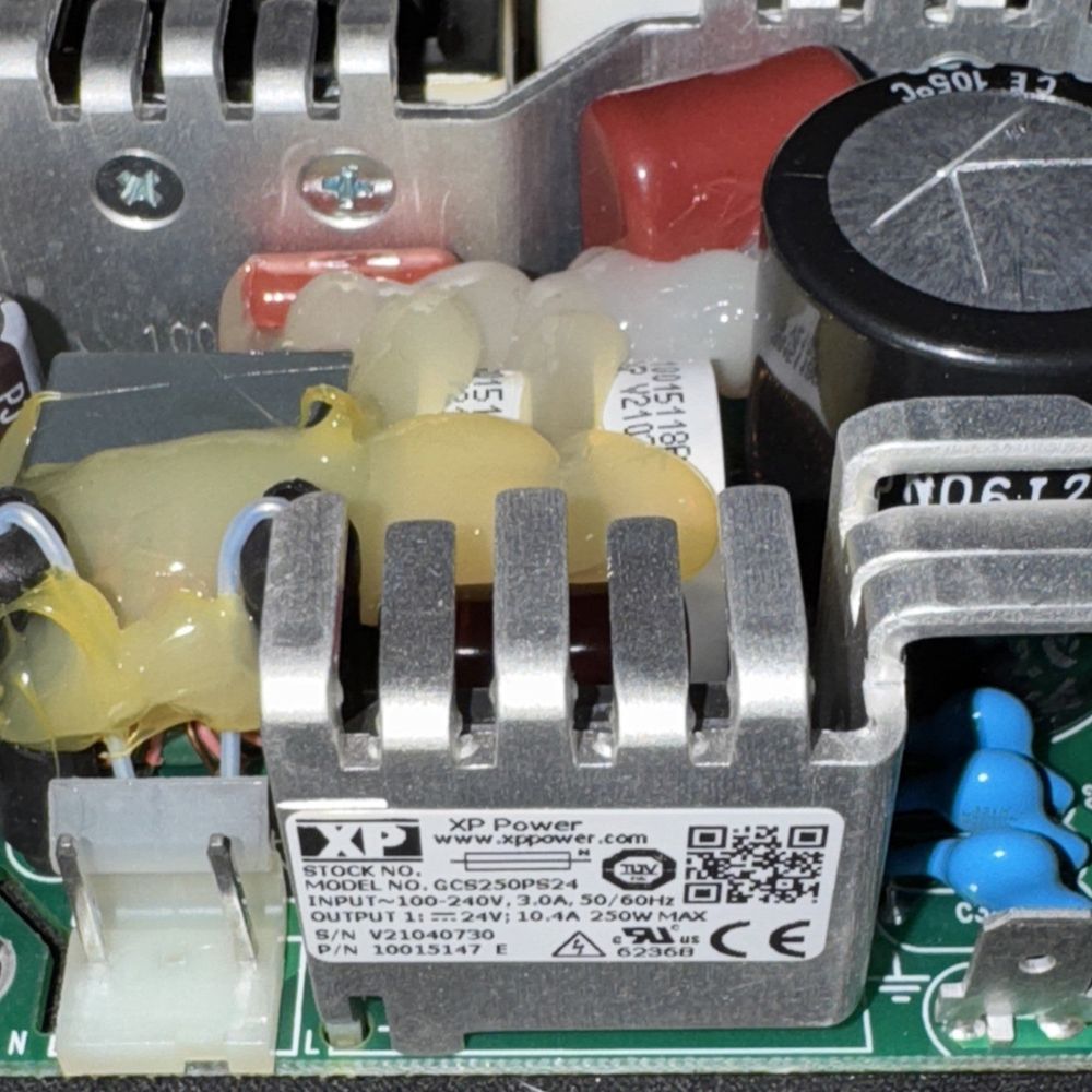 XP Power GCS250PS24 AC/DC Open Frame Power Supply – a close up of a circuit with a bunch of wires