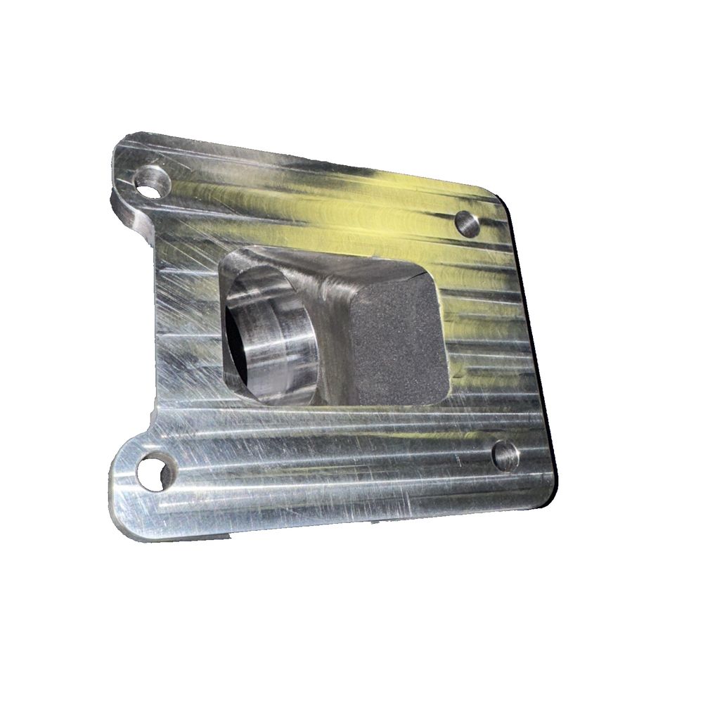 DBV2 Turbo Adapter (Please See Photos) – a metal object with a yellow and black design