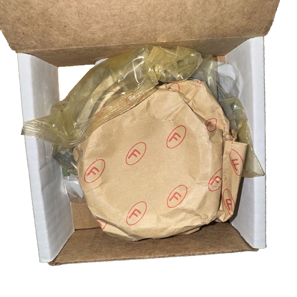 Complete Pump Rotor/Slide Package 13-Vane 4L40E/60E/65E/70E, 5L40/50 (#42288B), GFX PRo – a brown box with a brown paper bag inside
