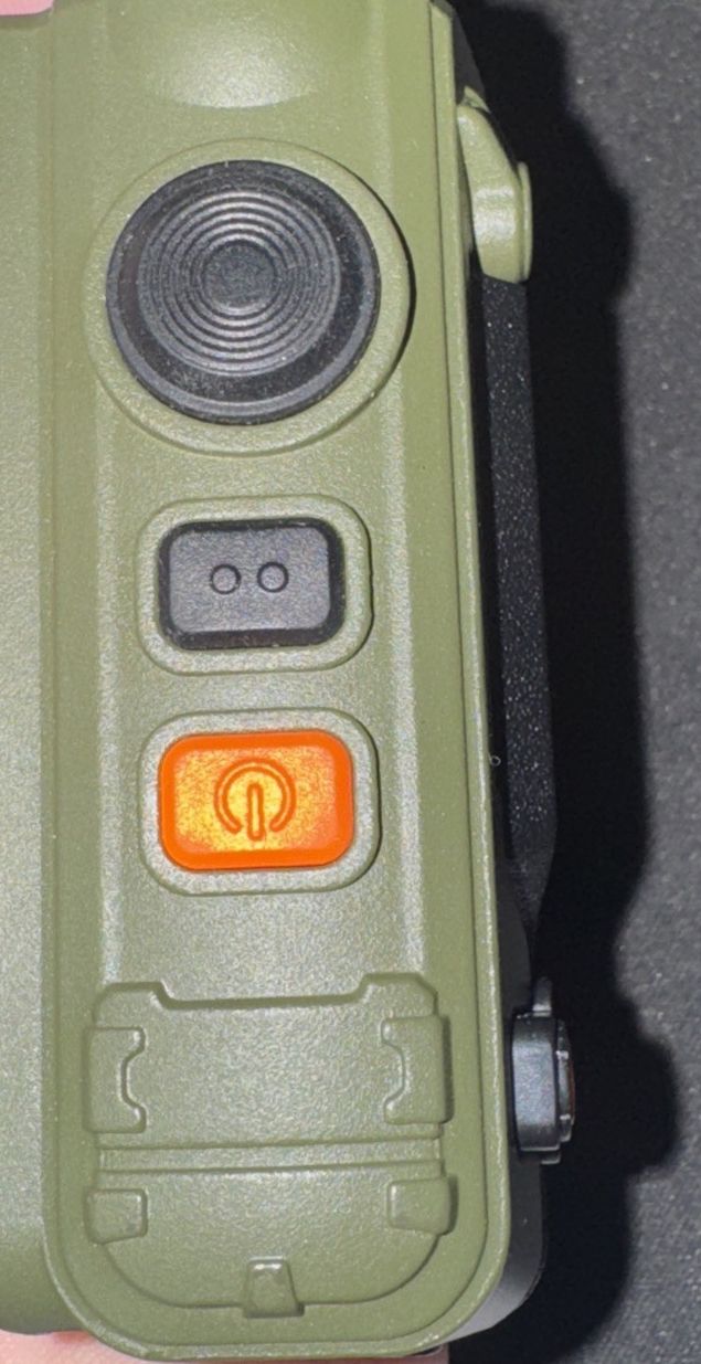 Motorola 2 Way Walkie Talkie Talkabout (No Batteries/Cords) – a person holding a green camera in their hand