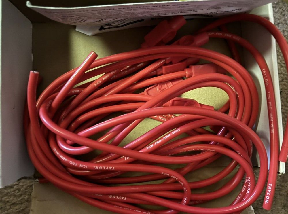 Taylor Cable 70254 Red Universal Fit 8mm TCW Pro-Wire Ignition Wire Set – a box of red hoses