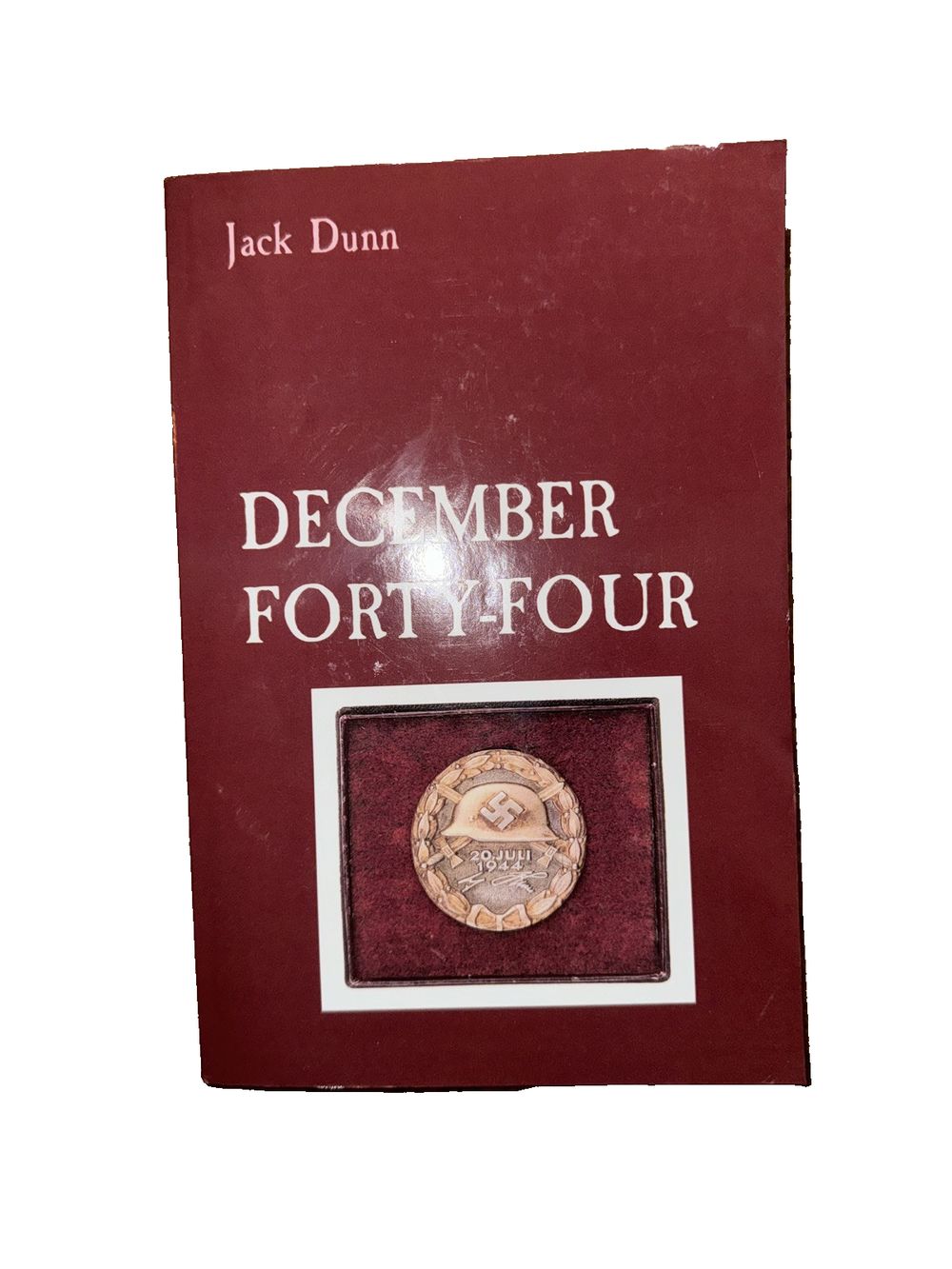 December Forty-Four, DaveyDooDeals – a book with a picture of a man on it