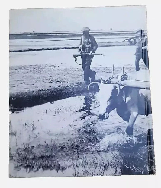Time Life World War II China-Burma-India Book | WWII History & Photos, DaveyDooDeals – a black and white photo of a man on a beach