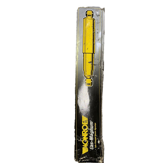 Monroe 34985 Gas-Magnum Shock Absorber – a yellow and black box with a black handle