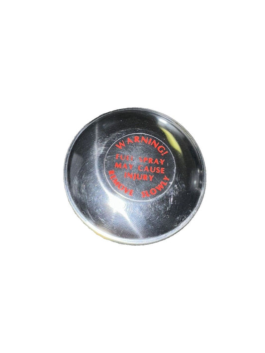MotoRad MGC23 Fuel Cap - Ford F-150 (75-76) F-100 (53-76) F-250 (53-76) F-350 ( – a metal knob with a red and black logo