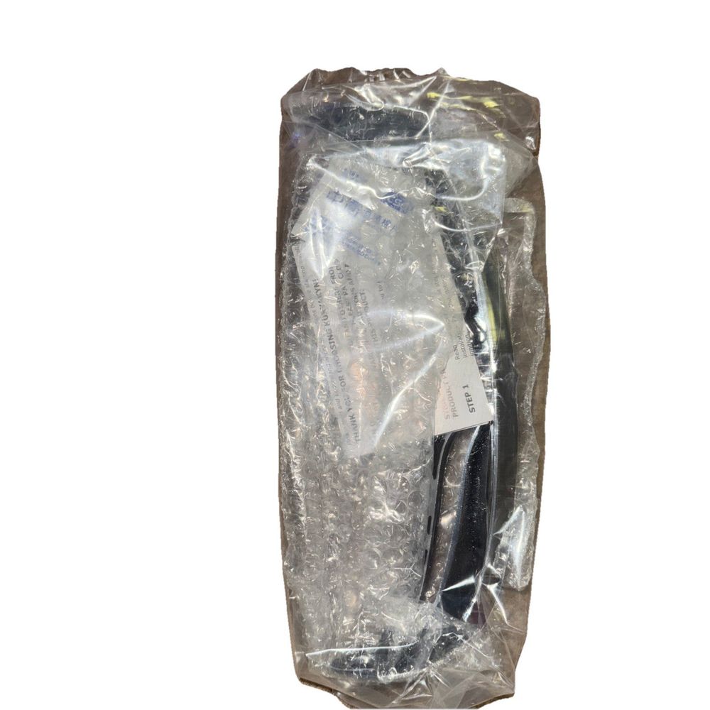 07-17 FLSTF LO REAR FENDER TIP PN 7787, Kuryakyn – a plastic bag with a knife inside