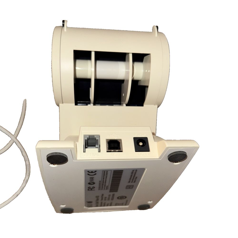 SLP 450 Thermal Printer Seiko Instruments – a white and black machine with a white handle