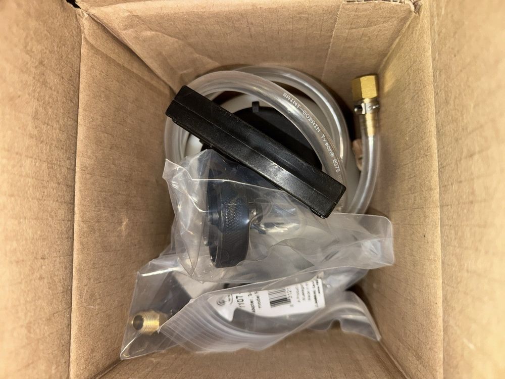 Motive Products Power Bleeder Brake Bleeder - Ford / Import Three Prong Style – a box with a black and white cable in it